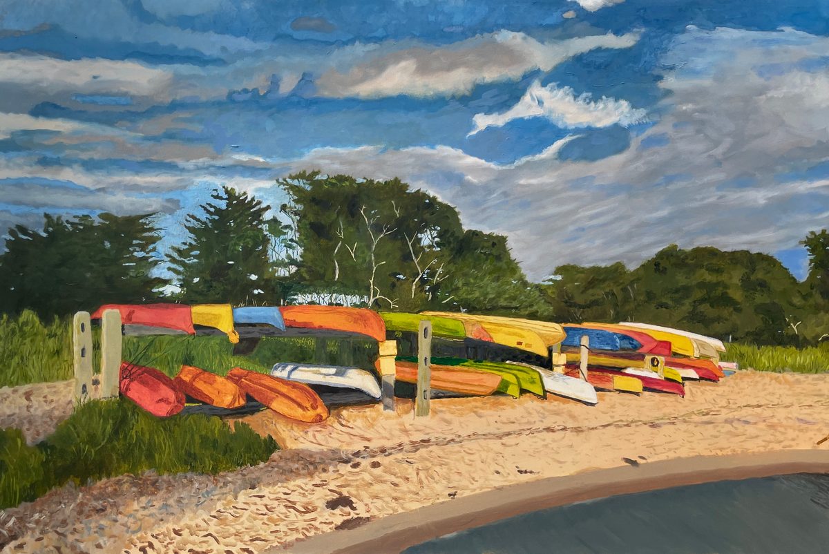 The Kayaks at Accabonac: painting of brightly colored kayaks and canoes stacked on racks along a sandy shore, with trees beneath a dramatic cloudy sky.