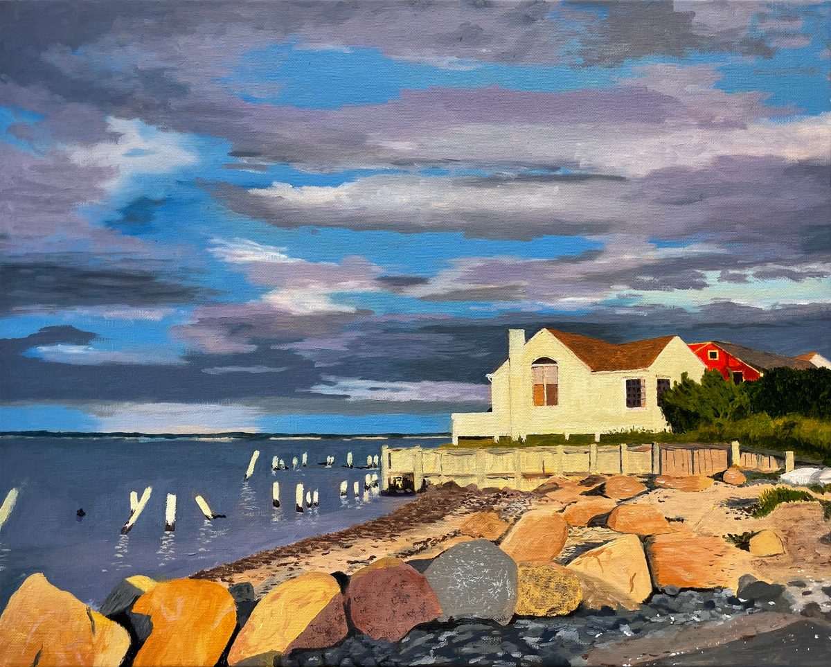 The Cottage on Gerard: painting of a white waterfront building beside a red-roofed building, with large rocks and old pilings along the shore under a dramatic sky.